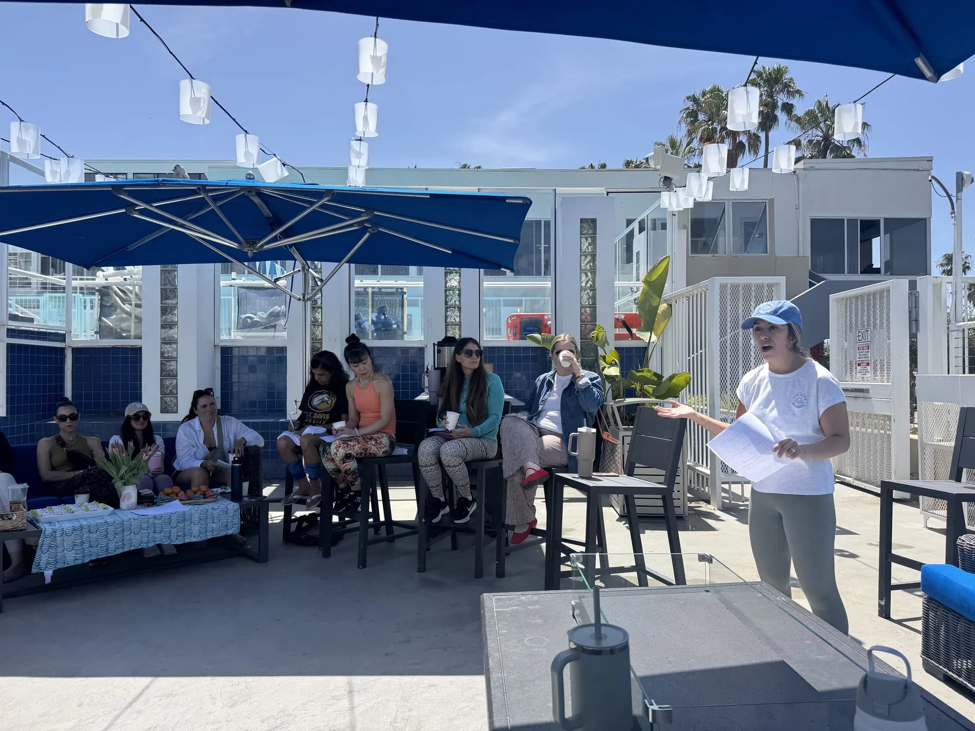 Sally leading the wellness reset session on the club terrace